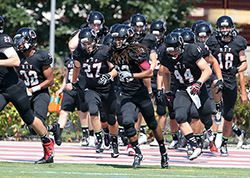 Football Team Takes the Field.